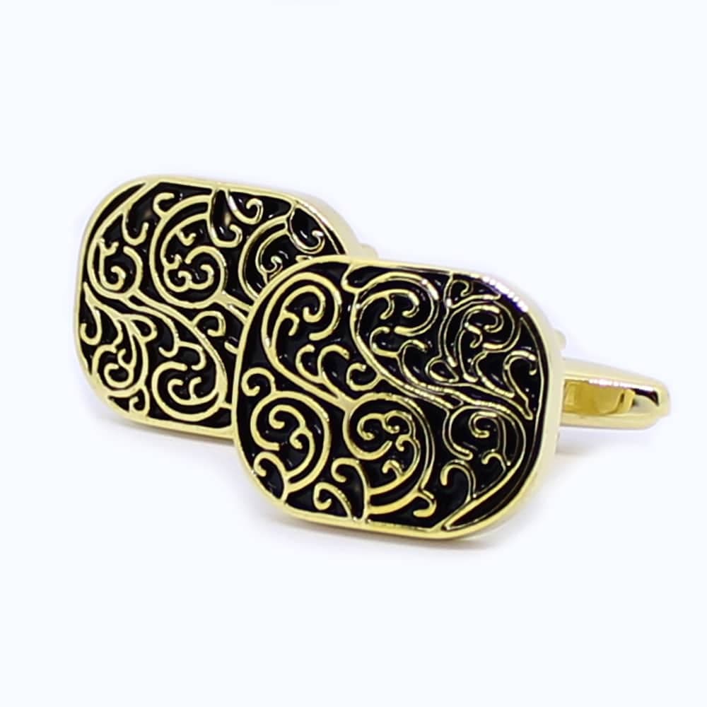 Rechteckige Vintage-Manschettenknöpfe – Gold mit eleganten Verzierungen.